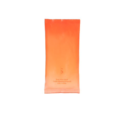 Orange tube of sunscreen on a light gray background